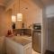 Aloha Ganga view 2BHK Apartment by Almost Heaven
