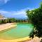 Superbe bord de mer, accès lagon et piscine privée