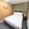 New County Hotel & Serviced Apartments by RoomsBooked