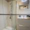 Cosy Loft tarif avec 1 ou 2 chambres 2 ou 4 personnes, vue parc et piscine