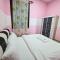 Palazio 3 bedroom balcony lake view high floor by GDRAGON HomeStay