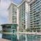 Palazio 3 bedroom balcony lake view high floor by GDRAGON HomeStay