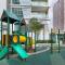 Palazio 3 bedroom balcony lake view high floor by GDRAGON HomeStay