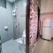 Palazio 3 bedroom balcony lake view high floor by GDRAGON HomeStay