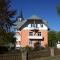 Moderne Ferienwohnung am Thüringer Wald perfekt für Familien, Paare & Urlaub mit Hund, mit Sauna & Balkon