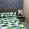 Anne and Gie 1 BR Condo Unit with kitchenette in Trees Residences SMDC - 马尼拉