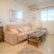 Spacious ground floor apartment overlooking the beautiful communal pool