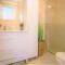 Spacious ground floor apartment overlooking the beautiful communal pool