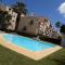 Spacious Portuguese flat with pool next to beach