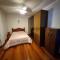 Apto aconchegante quarto e sala reversível