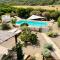 Villa Shanti ad Alghero con piscina, Jacuzzi, Yoga deck, per 18 persone