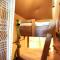 Glamping Safarilodge Grutte Fiif met airco, extra keuken op veranda en privé achtertuin