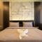 Escape Condominium By A property