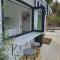 Tiny house with greenhouse dining
