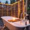 Luxury Glamping Cabin with Outdoor Bath on Cornish Meadow