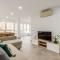 Modern Apartment Steps from the Beach