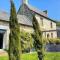 Manoir de la Nogrie - Chambre de charme avec accès privatif - Piscine chauffée sur domaine 5 étoiles - Val-dʼIzé