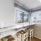 Renovated dog-friendly condo with ocean views, pool, & beach access