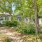 Oak Island Home with Spacious Backyard and Porch