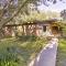 Mid-Century Brownsville Hideaway with Patio and Yard! - Brownsville