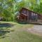 Roomy Riverfront Trout Valley Cabin with Porch!