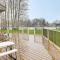 Cadillac Vacation Rental with Dock on Lake Mitchell!