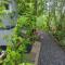 Tuinhuisje in het groen