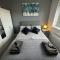 3 Bed Home for Contractors & Relocators with Parking, Garden & WiFi 5 mins walk to Town Centre & Train Station