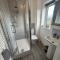 3 Bed Home for Contractors & Relocators with Parking, Garden & WiFi 5 mins walk to Town Centre & Train Station