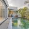 Luxury resort style villa pool by Custom Bnb Hosting