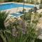 Three bedroom villa with private pool and landscaped garden close to the beach