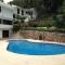 Villa Palmitas acogedor departamento nivel piscina gigante jardines