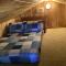 The Manor- 4 BR Home with Pool Table, Swimming Pond and Sand Volleyball