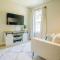 City Retreat - 4 Bedroom Oasis with King & Private Yard near Downtown