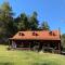 Log Cabin in the Field