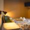 Claves Claustri - Camere in appartamento storico