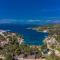 Uniquely designed Villa Ivana with outdoor Jacuzzi nearby the pebble Banje beach at the Island of Solta