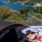 Uniquely designed Villa Ivana with outdoor Jacuzzi nearby the pebble Banje beach at the Island of Solta