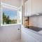 Uniquely designed Villa Ivana with outdoor Jacuzzi nearby the pebble Banje beach at the Island of Solta