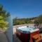 Uniquely designed Villa Ivana with outdoor Jacuzzi nearby the pebble Banje beach at the Island of Solta - Rogač