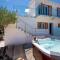 Uniquely designed Villa Ivana with outdoor Jacuzzi nearby the pebble Banje beach at the Island of Solta