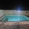 Casa Rural Oasis, una casa rural en Puertollano, agradable, con Piscina en zona tranquila - Puertollano