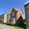 Newts Place Cottage - Part of the The Bay Filey Holiday Village with pool, gym and direct beach access, pub, restaurant, tennis and meadows walks
