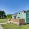 Green Tiny House with shared pool