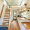 Green Tiny House with shared pool