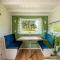 Green Tiny House with shared pool
