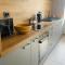 Modern Apartment with Fireplace & Stylish Kitchen