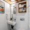 Riverside Tiny Cabin w Hot Tub, Fire Pit, & Kayaks