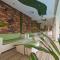Gods Touch Apartments Signature