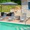 Cozy holiday house CAPREE with pool in a quiet location near the beach Rabac